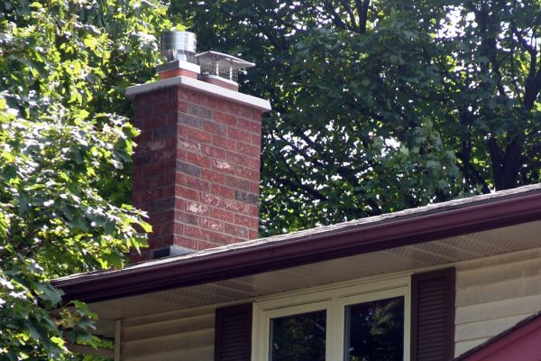 Furnace and fireplace chimney restored to code